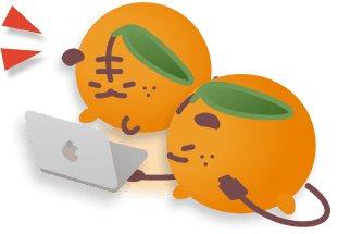 Drawing of orange tigers around a laptop